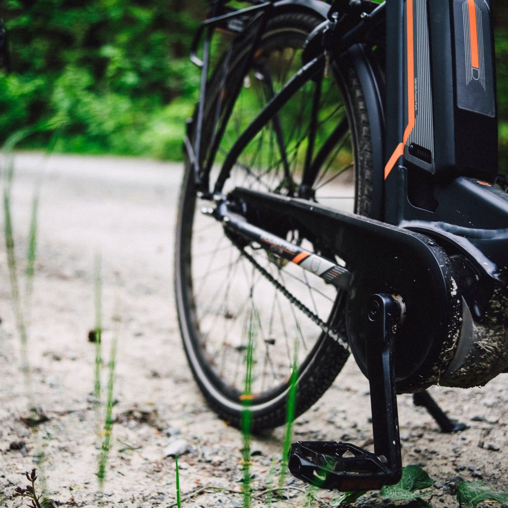 E-bike parked on sandy path Gili Islands