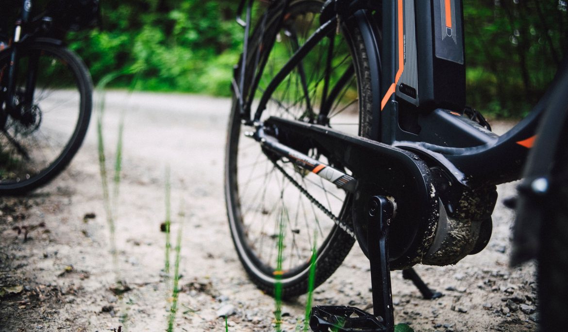 E-bike parked on sandy path Gili Islands