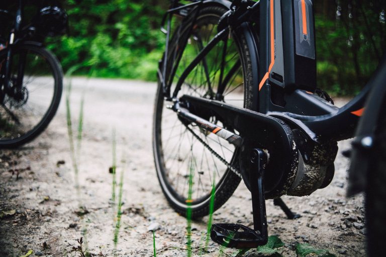 E-bike parked on sandy path Gili Islands